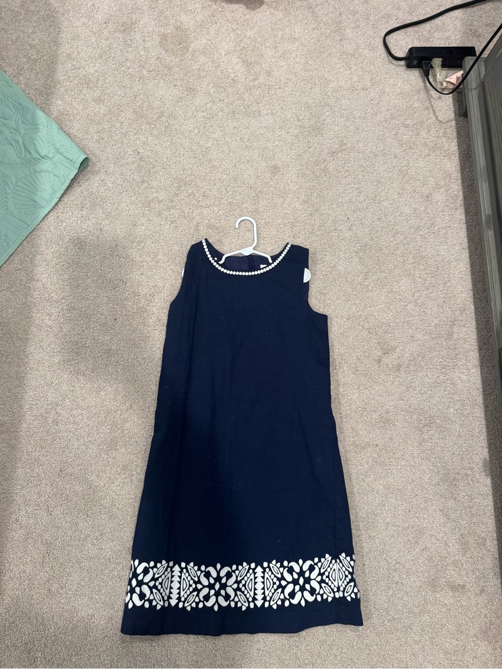 Navy Sleeveless Girls' Dress with White Trim and Hem Embroidery
